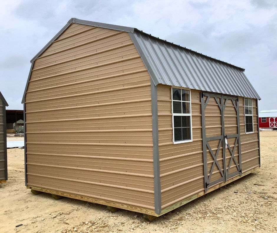 12' x 16' Metal Storage shed with side door and upper lofts.