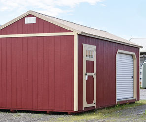 Side Utility Shed with a 36" Shop Door with Transom Windows plus a roll up door.