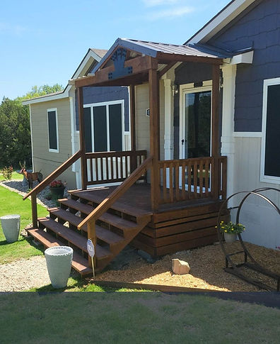 Wooden front porch with gable roof on Texas home - Easy Rent to Own Payment Plans.