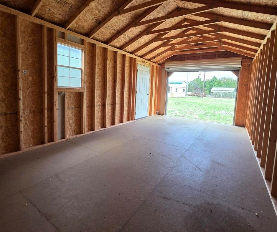 Thumbnail: Interior view of 12x24 portable garage with roll-up door open