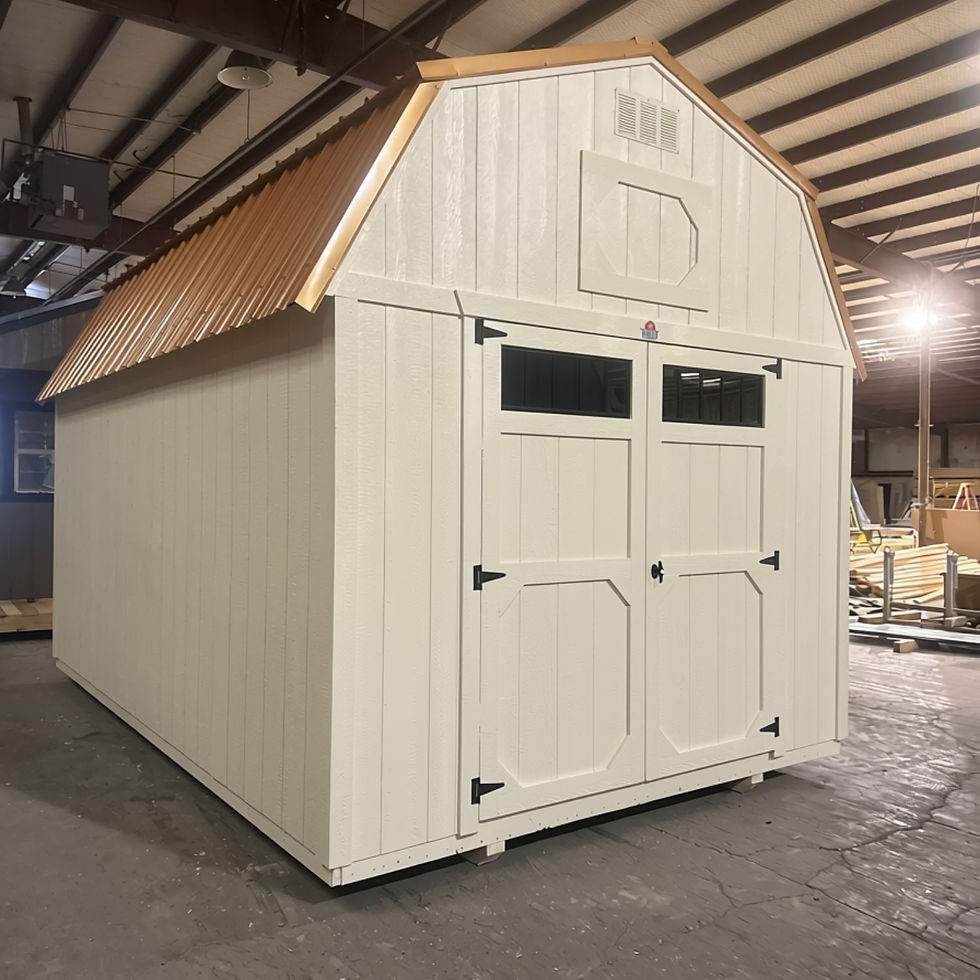 Front angle view of 10' × 16' Derksen Lofted Barn Storage Shed with transom windows above the double doors