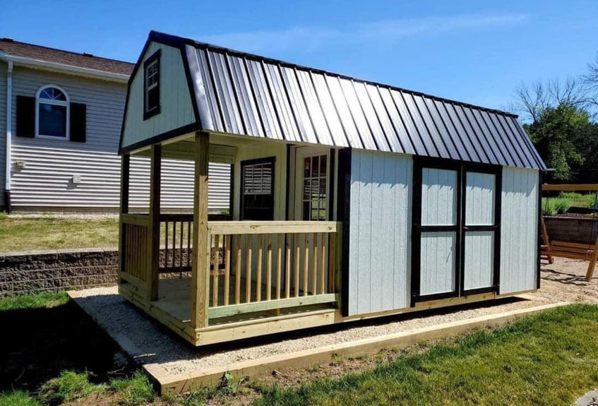 10x20 Lofted Barn Cabin with upgraded 6' deep front porch and extra double shop door.