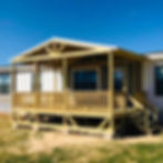12x20 natural wood portable porch with gable roof for mobile and modular homes in Texas.