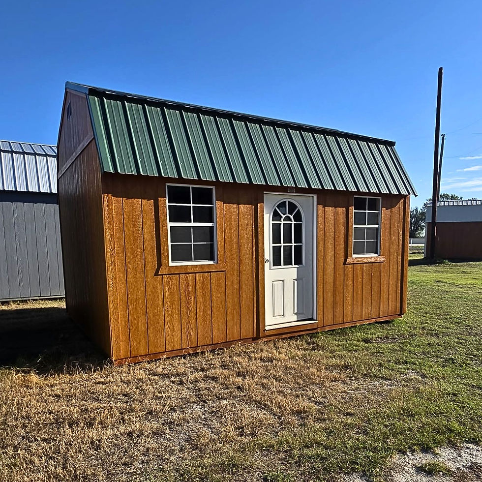 Front view of a 12x16 pre-owned lofted barn with cedar urethane finish, single entry door and two windows