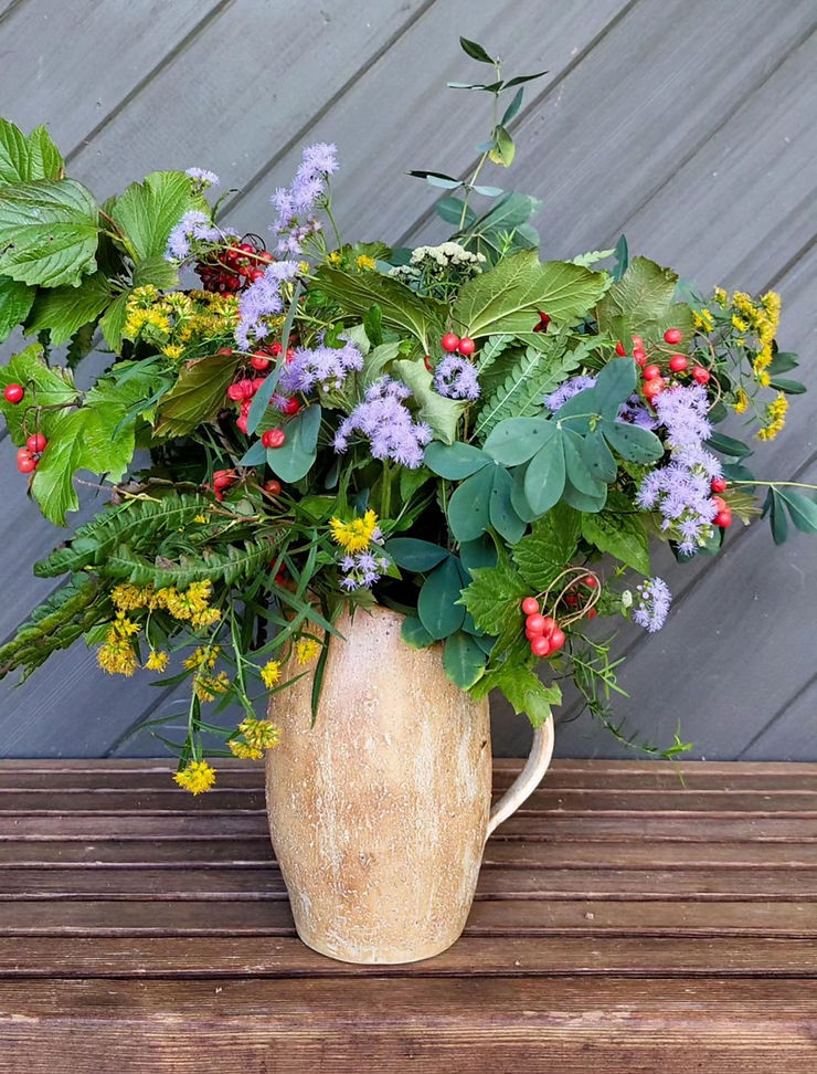 pitcher with flowers