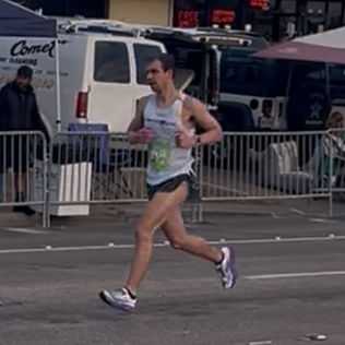 Coach Shane running