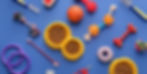 Different pet accessories and food on blue background, top view.jpg