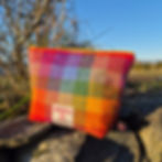 Large handmade Harris Tweed® pouch in rainbow check, crafted in Scotland with cotton lining and YKK zip – bold, functional, a