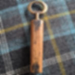 Bottle opener made from reclaimed whisky stave with antique gold finish, approx. 15cm long