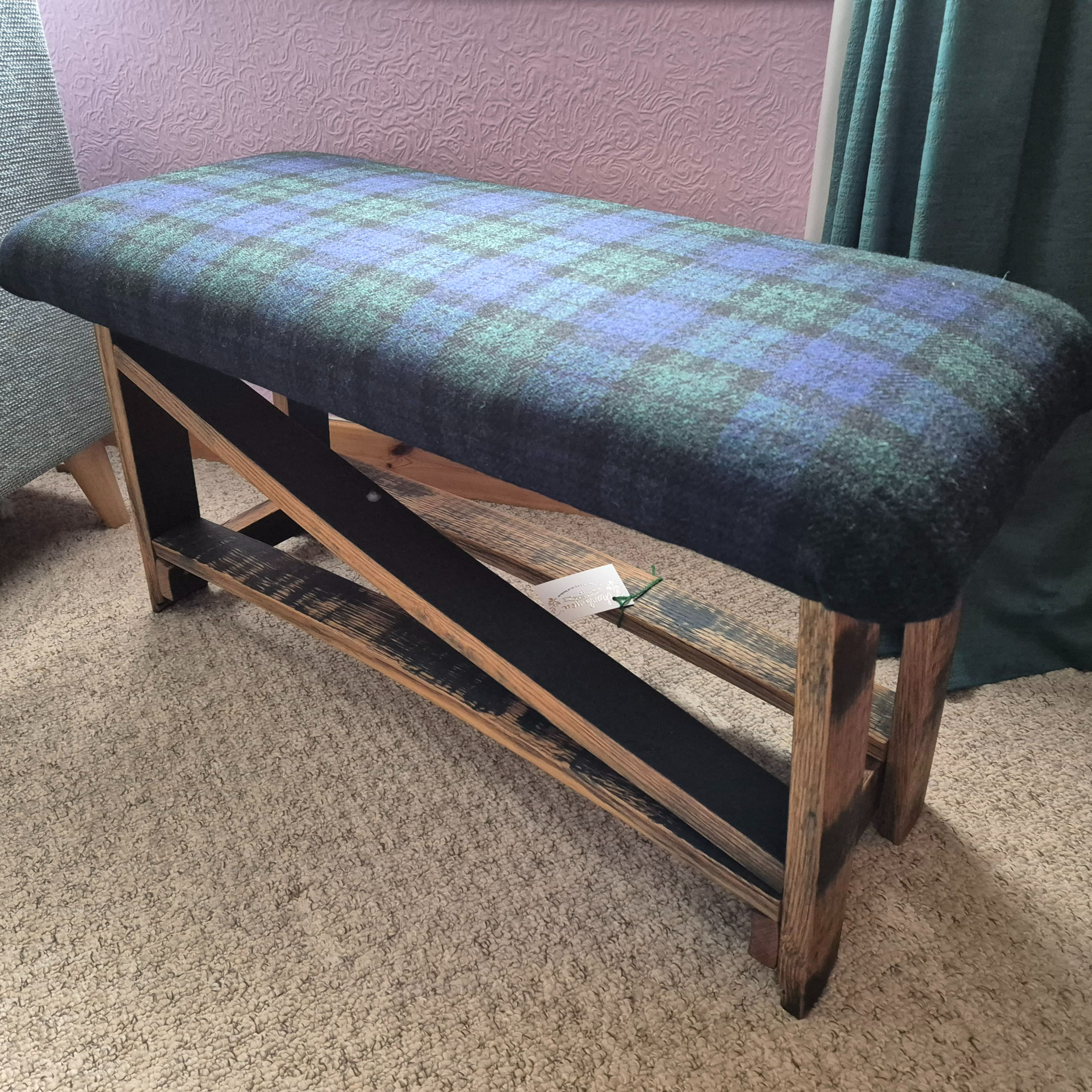Handcrafted bench made from whisky staves and Harris Tweed® A020 Blackwatch, celebrating Scottish heritage