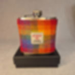 6oz stainless steel hip flask with Harris Tweed® Rainbow sleeve, handmade in the Highlands.