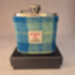 Handmade 6oz stainless steel hip flask with Harris Tweed® Pale Blue sleeve, presented in silk-lined gift box with funnel.