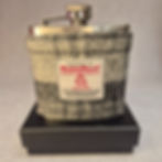 Handmade 6oz stainless steel hip flask with Harris Tweed® No. A0235 sleeve, presented in silk-lined gift box with funnel.