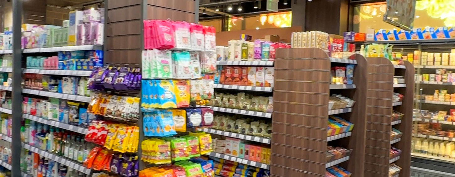 Retail aisles with custom shelving inside Kidbrooke organic food store