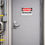 Thumbnail: Danger Benzene Authorized Personnel Only safety sticker mounted on industrial metal door