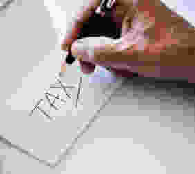 person holding black pen