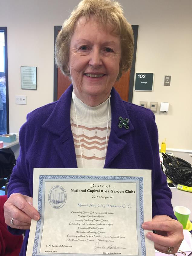 Esther accepting Club Certificate