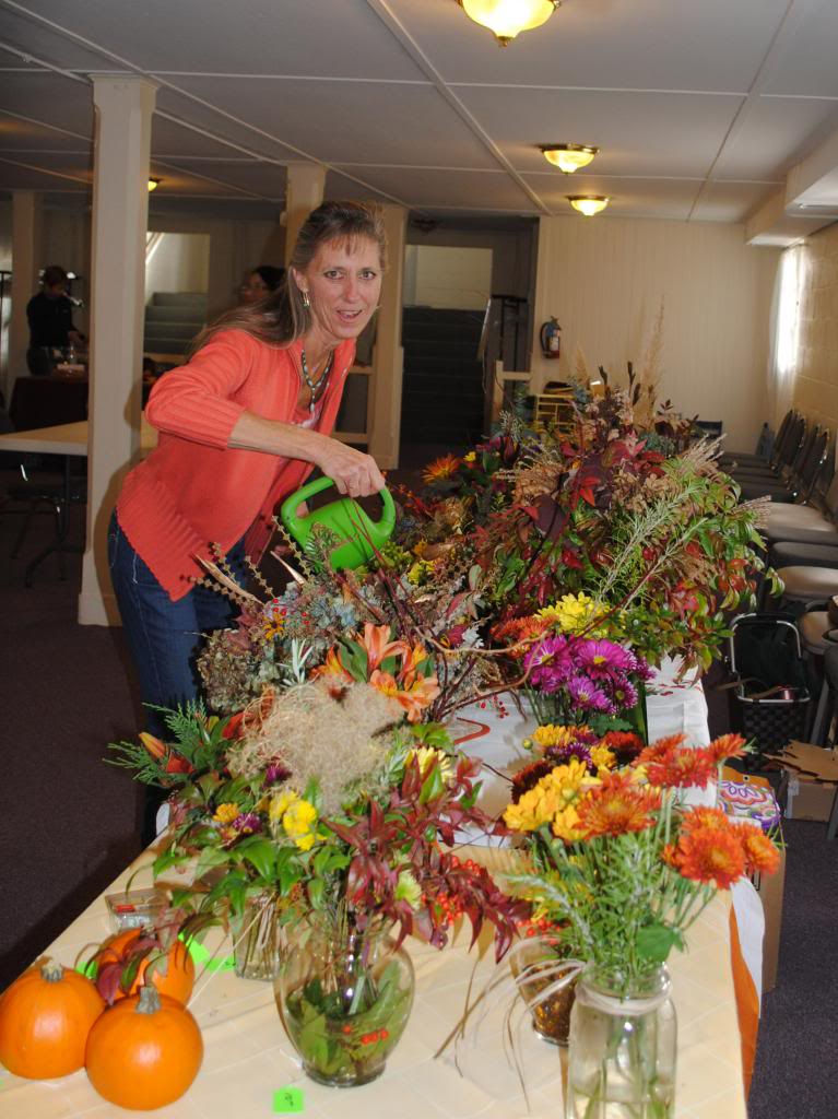 Club Flower ArrangementPam Smart managing Sale at St. Thomas Church Farmer's Mkt. 11/23/13