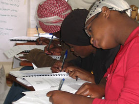 Girls in Kenya work on budgets.