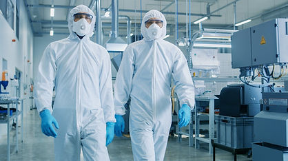 Employees in Bunny Suits in Clean Room