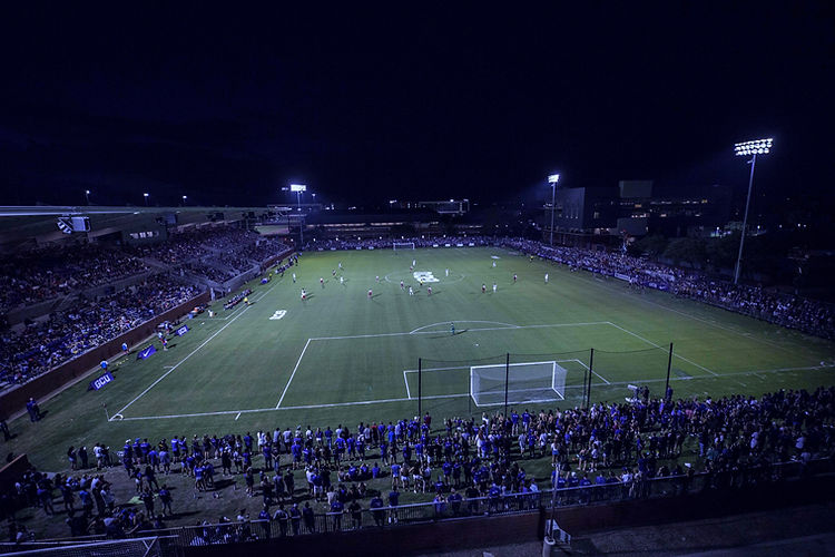 Football pitch image at night