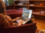 mockuuups-woman-working-on-the-macbook-pro-mockup-in-office-environment.jpeg