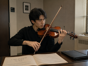 man practice violin in practice room