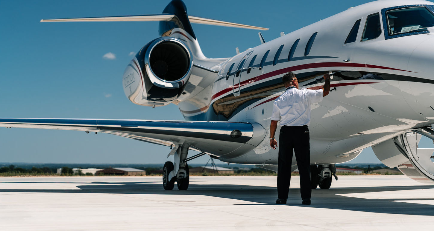 private aviation hangar, private aircraft hangar, aircraft hangar rental, hangar space available, Executive jet inside Black Tie Aviation hangar at Granbury Regional Airport KGDJ. Private aircraft storage and executive hangar space near Fort Worth Texas