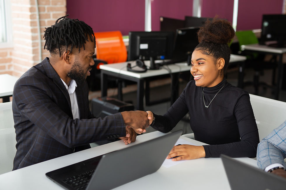 team-young-african-people-office-work-table-with-laptop-with-handshake.jpg