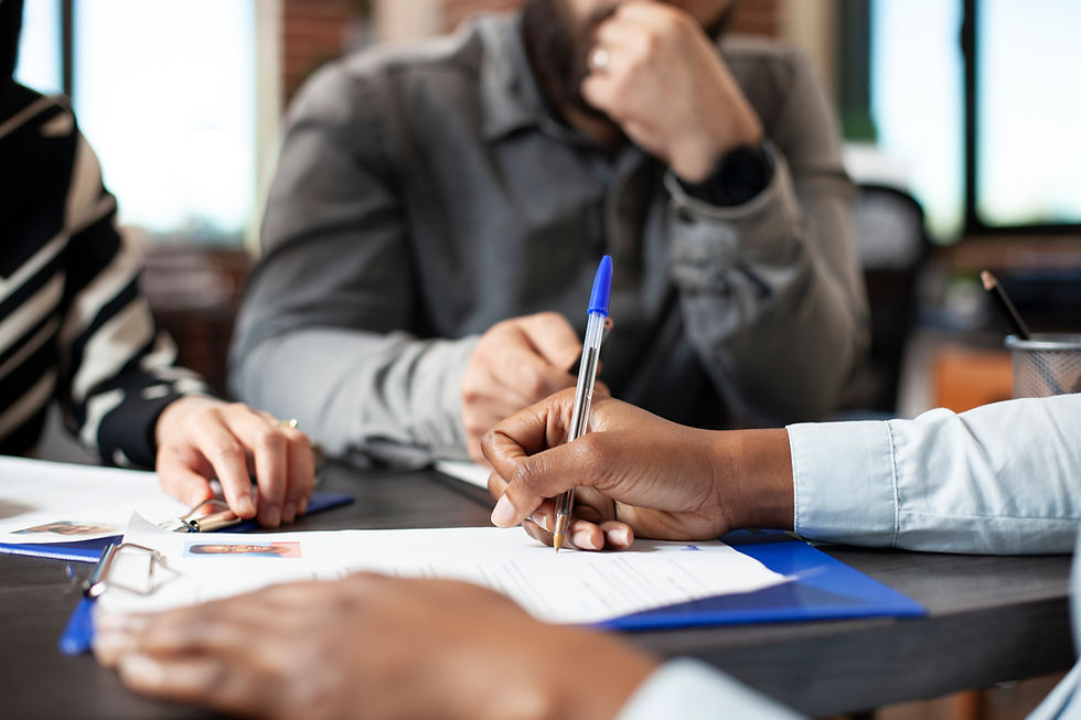 black-person-signing-job-offer-paperwork.jpg