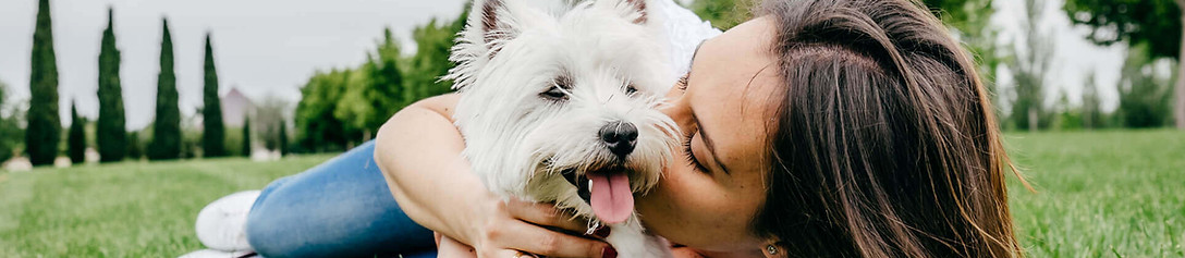 Woman & Pet enjoying lawn & landscape without pest