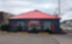 Abby's Pizza commercial building with red roof
