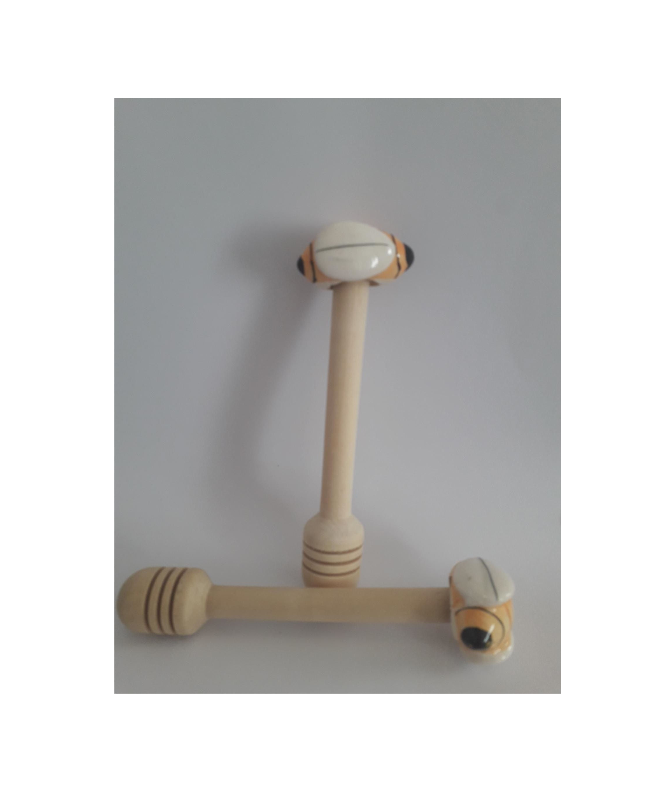 Honing lepel hout met bijen decoratie.