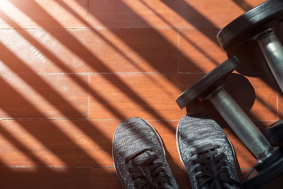 workout-shoes-and-dumbbells-on-wood-floor-2026-03-18-13-50-19-utc.jpg