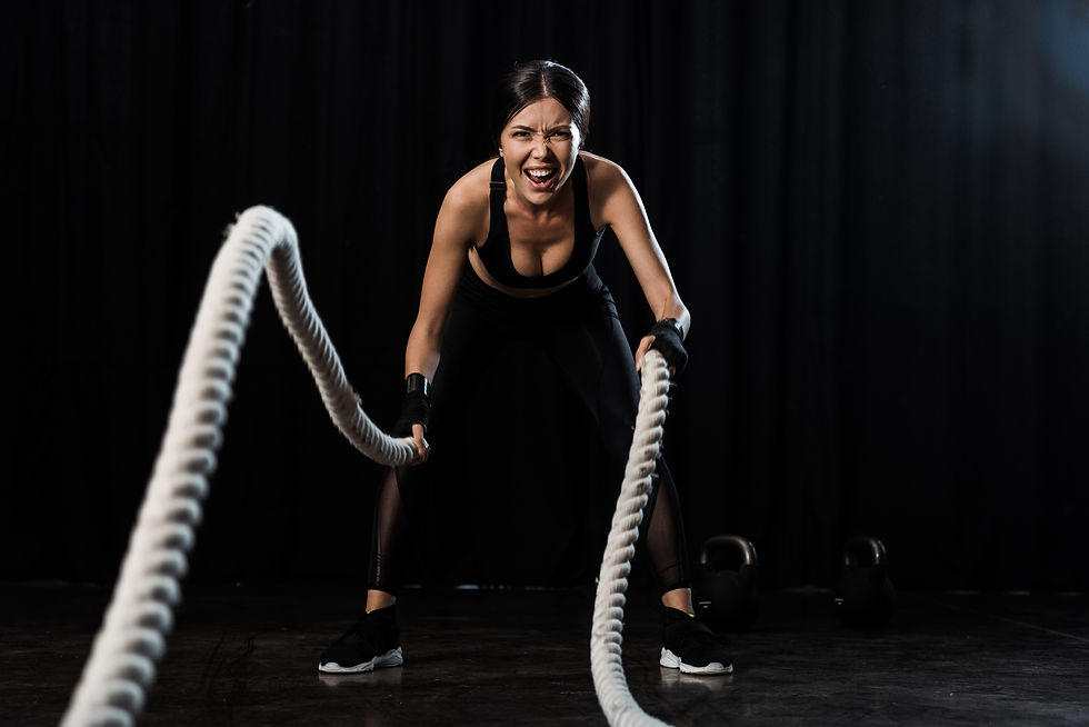 selective-focus-of-sportswoman-exercising-with-bat-2023-11-27-04-58-46-utc.jpg