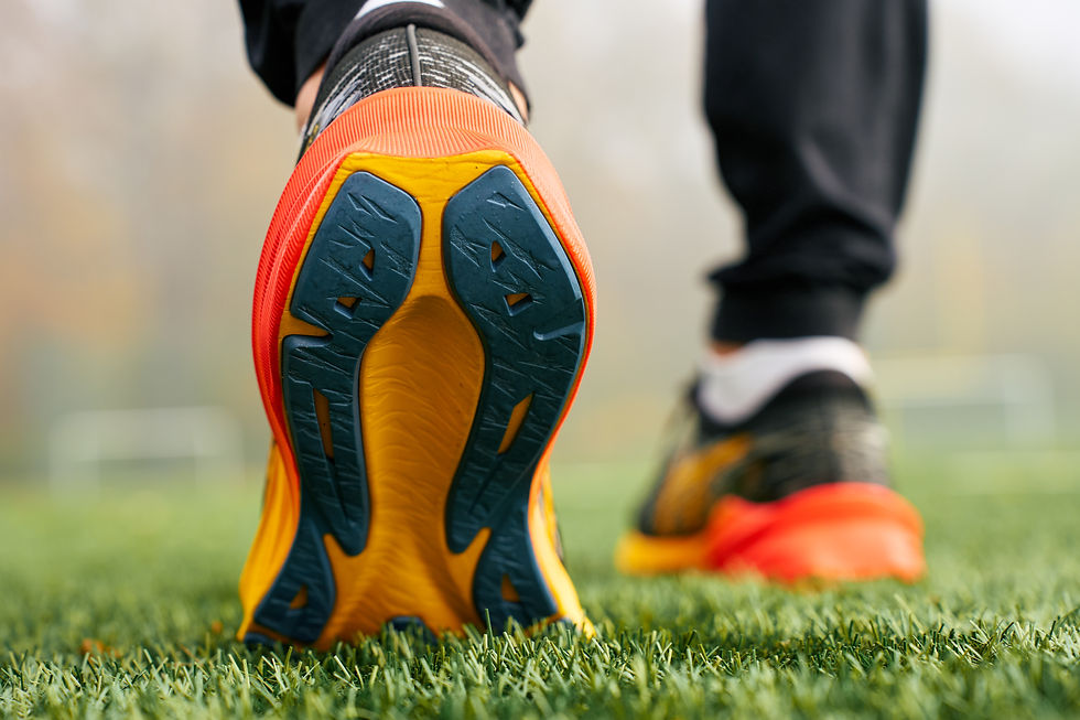 athlete-wearing-modern-running-shoes-walking-on-gr-2026-03-24-04-03-46-utc.jpg