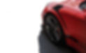 red-sport-car-front-side-view-black-wheel-with-metallic-silver-color.jpg