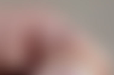 a tiny tick on a person's finger