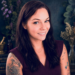 Ashley James, wellness coach and founder of The Apothecary Project, in a professional headshot focused on nutrition, lifestyle, and holistic wellness.