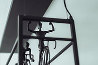 Close-up detail of cycling figurines in action, adding a sporty ambiance at Arrivée.