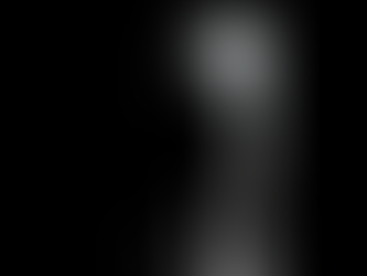 dark figure in a backlit doorway