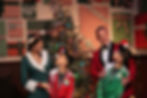 mom, 2 boys, dad in Christmas outfits by a tree - vintage looking