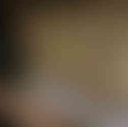 Internal view of a resort with many floors and colorful lobby