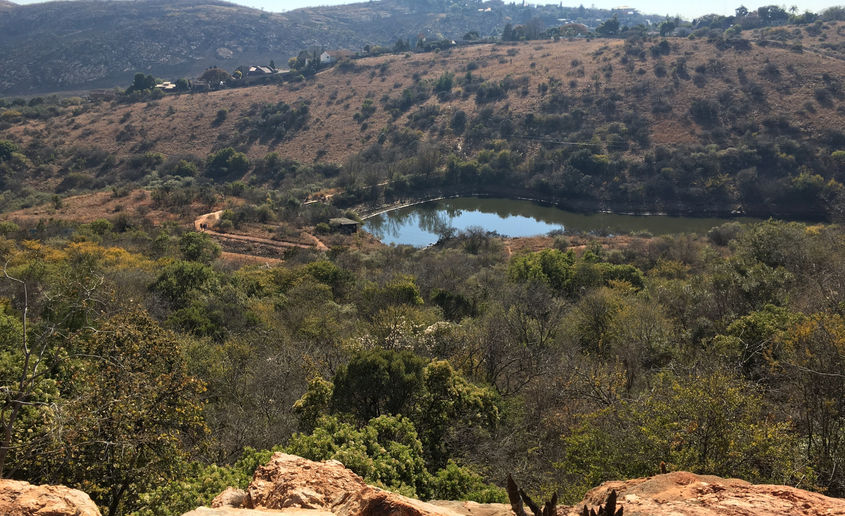 Kloofendal Dam and hills of Kloofendal Nature Reserve in Krugersdorp.
