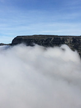 Clouds on Table Mountain seen from top of Devil's Peak hike.