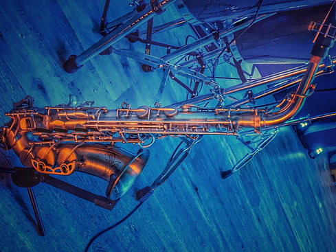 Unison S300II Artist model, rotated, with blue background