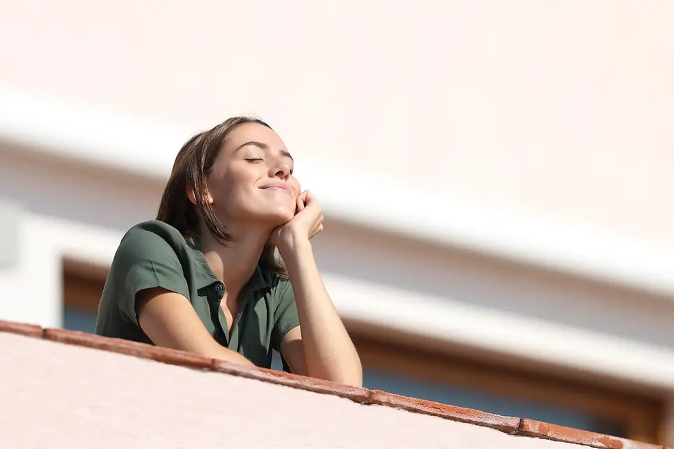 Woman leaning on a counter with a thoughtful expression, representing a customer waiting for updates, clear turnaround times, and rush or same day alteration options at CleanMeNow in Draper Utah
