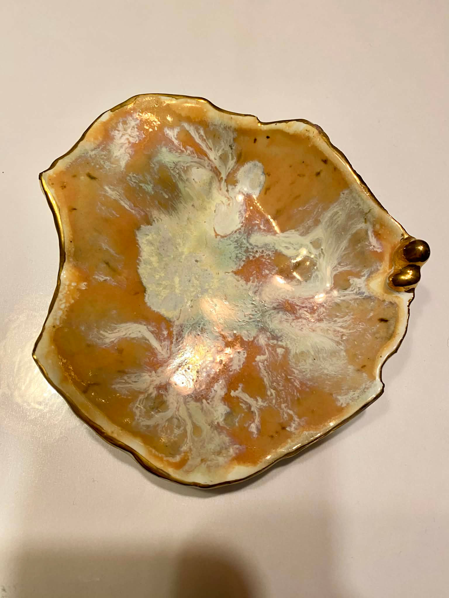 Orange rund smykkeskål