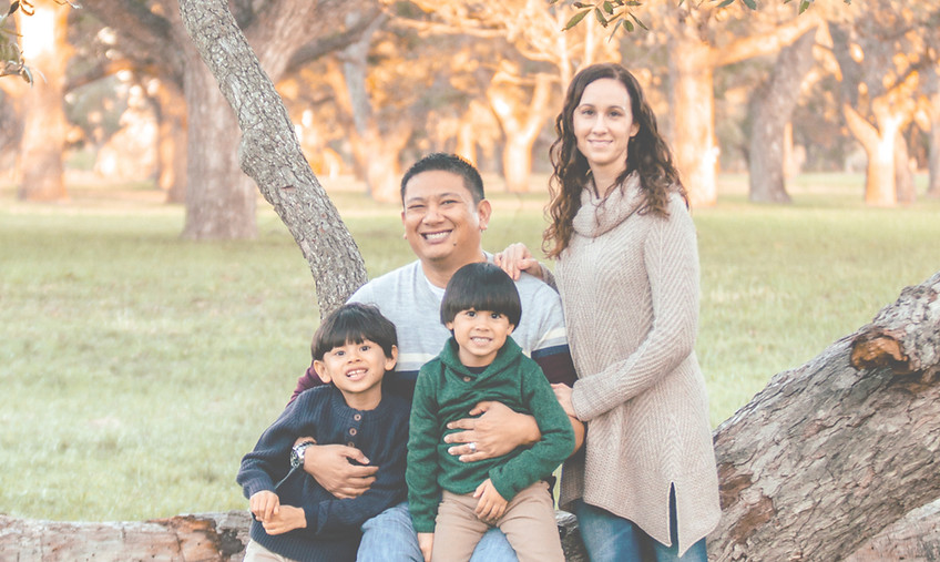 Family Photo of sleep consultant Andrea Estacion. Includes mother, father, and two sons