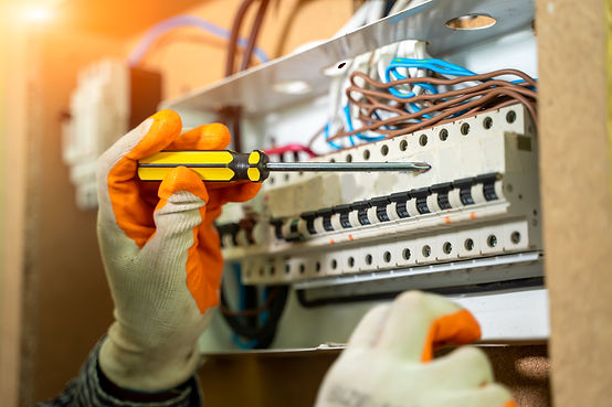 electrician-installing-socket-new-house-